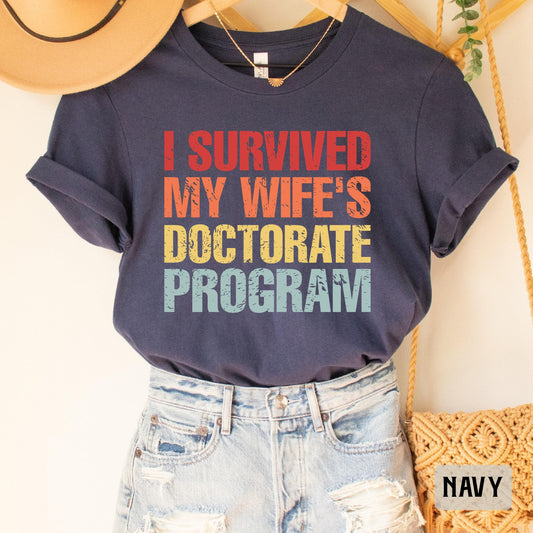 Funny PHD Graduation Shirt I Survived My Wife's Doctorate Program Shirt PHD Dissertation Shirt Sarcastic Gift For PHD Husband